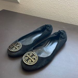 Tory Burch black suede flats.